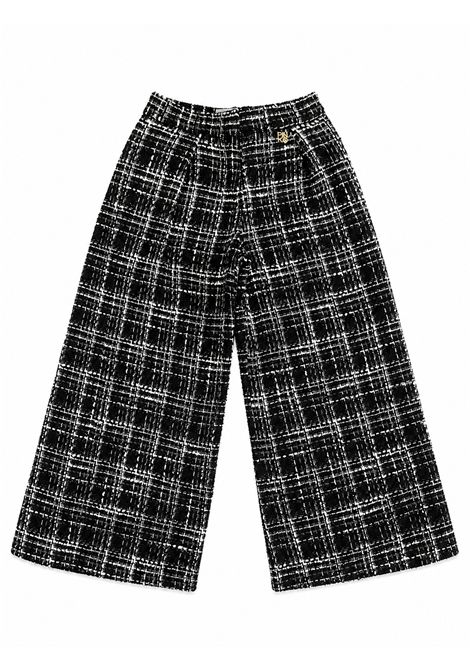 Pantalone con inserti laminati